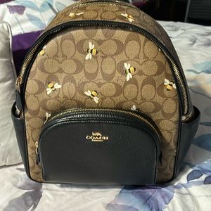 Used Coach Medium brown with Bumble Bees Backpack Purse